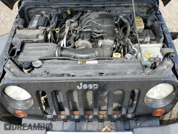 2013 Jeep Wrangler Unlimited Sahara with VIN 1C4BJWEG8DL678692, listed as a Copart auction lot 62289785 with 132,528 mi miles and Clean title. Bid and sale history available at DreamBid. Image 12.