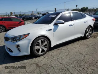 2018 Kia Optima SX with VIN 5XXGW4L27JG186136, listed as a Copart auction lot 55990975 with 86,540 mi miles and Salvage title. Bid and sale history available at DreamBid. Image 1.
