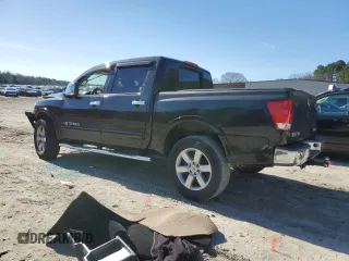 2015 Nissan Titan SL with VIN 1N6AA0EC4FN509604, listed as a Copart auction lot 49650865 with 100,184 mi miles and Salvage Title. Bid and sale history available at carsss.com. Image 2.