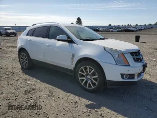 2012 Cadillac SRX Premium Collection with VIN 3GYFNFE39CS515037, listed as a Copart auction lot 55797235 with 146,778 mi miles and Salvage title. Bid and sale history available at DreamBid. Image 4.
