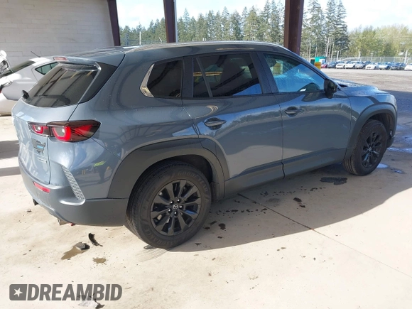 2023 Mazda CX-50 S Select with VIN 7MMVABAM2PN110674, listed as a IAAI auction lot 42014100 with 36,827 mi miles and . Bid and sale history available at DreamBid. Image 4.