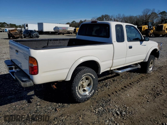 1999 Toyota Tacoma PreRunner with VIN 4TASM92N0XZ559544, listed as a Copart auction lot 86626024 with 209,794 mi miles and Salvage title. Bid and sale history available at DreamBid. Image 3.