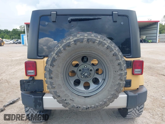 2013 Jeep Wrangler Unlimited Sahara with VIN 1C4BJWEG8DL638404, listed as a IAAI auction lot 42586604 with 43,953 mi miles and . Bid and sale history available at DreamBid. Image 16.
