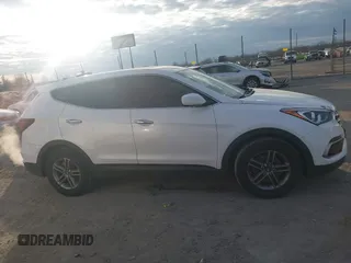 2017 Hyundai Santa Fe 2.4L z VIN 5XYZT3LB2HG412388, wystawiony jako IAAI lot #41174620 z przebiegiem 122 237 mil mil oraz . Historia ofert i sprzedaży dostępna na DreamBid. Obrazek 13.