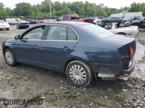 2005 Volkswagen Jetta 2.5L with VIN 3VWRG71K45M628981, listed as a Copart auction lot 58531595 with 128,217 mi miles and Salvage title. Bid and sale history available at DreamBid. Image 2.