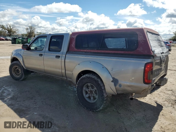 2004 Nissan Frontier XE with VIN 1N6ED29X24C436064, listed as a Copart auction lot 58916434 with 277,026 mi miles and Salvage title. Bid and sale history available at DreamBid. Image 2.