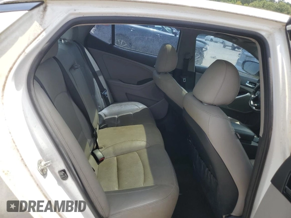 2013 Kia Optima EX z VIN 5XXGN4A72DG237404, wystawiony jako Copart lot #61293445 z przebiegiem 166 327 mil mil oraz Czysty tytuł • Clean title. Historia ofert i sprzedaży dostępna na DreamBid. Obrazek 10.