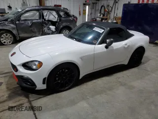 2019 FIAT 124 Spider Urbana Edition z VIN JC1NFAEK4K0141416, wystawiony jako Copart lot #83215744 z przebiegiem 49 725 mil mil oraz Czysty tytuł • Clean title. Historia ofert i sprzedaży dostępna na DreamBid. Obrazek 1.