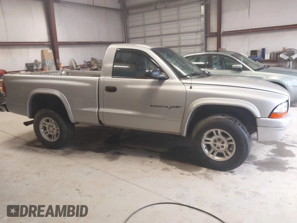 2001 Dodge Dakota with VIN 1B7GG26X21S118759, listed as a IAAI auction lot 41943297 with 156,372 mi miles and . Bid and sale history available at carsss.com. Image 13.