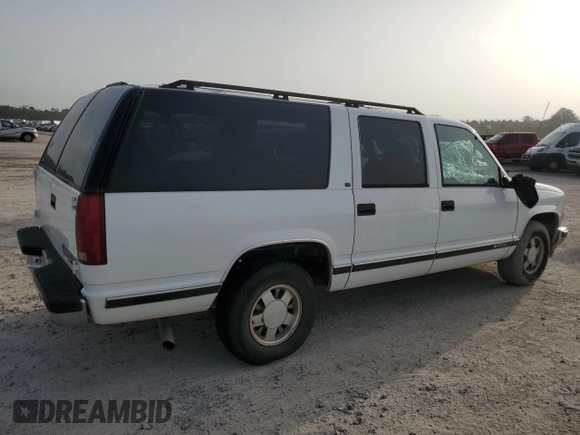 1996 Chevrolet Suburban with VIN 1GNEC16RXTJ391298, listed as a Copart auction lot 65437144 with 155,063 mi miles and Salvage Title. Bid and sale history available at carsss.com. Image 3.