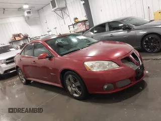 2009 Pontiac G6 GXP 1SA with VIN 1G2ZM577X94157511, listed as a IAAI auction lot 42296880 with 143,960 mi miles and . Bid and sale history available at DreamBid. Image 13.