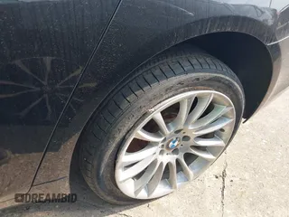 2015 BMW 7 Series 750Li xDrive with VIN WBAYF8C59FD655120, listed as a IAAI auction lot 41315152 with 82,244 mi miles and . Bid and sale history available at carsss.com. Image 17.