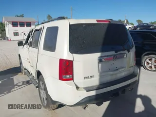 2015 Honda Pilot Touring with VIN 5FNYF3H98FB017564, listed as a IAAI auction lot 41587390 with 162,676 mi miles. Bid and sale history available at carsss.com. Image 3.
