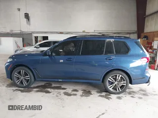 2022 BMW X7 xDrive40i z VIN 5UXCW2C06N9J14282, wystawiony jako IAAI lot #42122751 z przebiegiem 16 896 mil mil oraz . Historia ofert i sprzedaży dostępna na DreamBid. Obrazek 14.