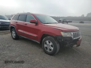 2011 Jeep Grand Cherokee Laredo with VIN 1J4RS4GG6BC704212, listed as a Copart auction lot 83753234 with 200,104 mi miles and Salvage Title. Bid and sale history available at DreamBid. Image 4.