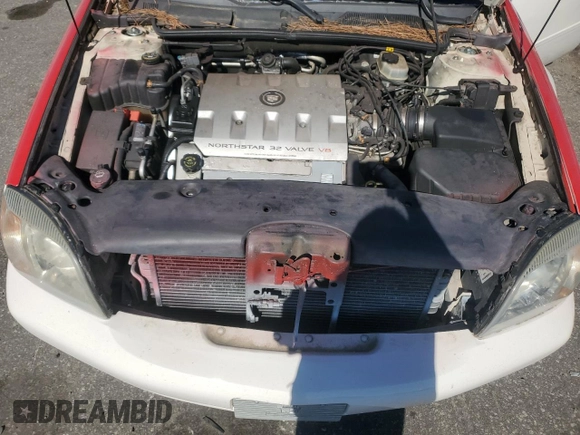 2002 Cadillac DeVille DTS with VIN 1G6KF57942U231877, listed as a Copart auction lot 76724554 with 180,082 mi miles and Salvage Title. Bid and sale history available at carsss.com. Image 13.