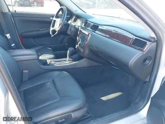 2014 Chevrolet Impala Limited LTZ with VIN 2G1WC5E33E1102480, listed as a IAAI auction lot 41666058 with 113,307 mi miles. Bid and sale history available at carsss.com. Image 5.