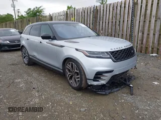 2018 Land Rover Range Rover Velar R-Dynamic HSE z VIN SALYM2RV0JA742422, wystawiony jako IAAI lot #42168647 z przebiegiem 65 298 mil mil oraz . Historia ofert i sprzedaży dostępna na DreamBid. Obrazek 1.