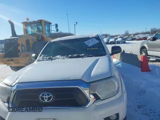 2013 Toyota Tacoma with VIN 3TMLU4EN2DM104490, listed as a IAAI auction lot 41636616 with 153,036 mi miles and . Bid and sale history available at DreamBid. Image 12.