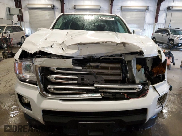 2016 GMC Canyon z VIN 1GTP6CE11G1366053, wystawiony jako Copart lot #85769384 z przebiegiem 134 303 mil mil oraz Szkoda całkowita • Salvage title. Historia ofert i sprzedaży dostępna na DreamBid. Obrazek 5.