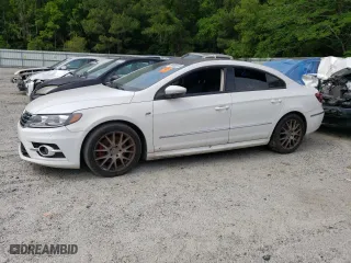 2015 Volkswagen CC R-Line with VIN WVWBN7AN1FE802582, listed as a Copart auction lot 49492973 with 124,521 mi miles. Bid and sale history available at carsss.com. Image 1.