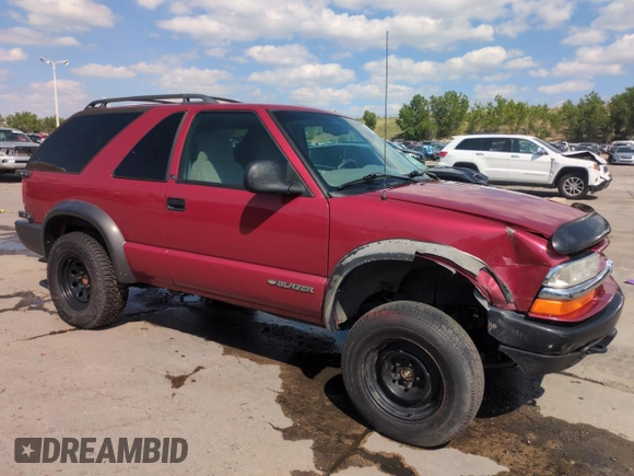 1998 Chevrolet Blazer LS with VIN 1GNCT18W5WK236585, listed as a Copart auction lot 62900435 with 123,272 mi miles and Salvage title. Bid and sale history available at DreamBid. Image 4.