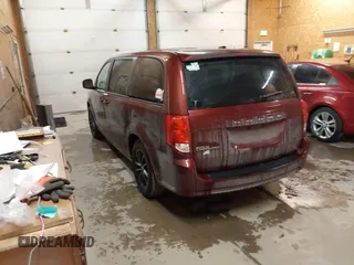 2019 Dodge Grand Caravan SE with VIN 2C4RDGBG6KR502910, listed as a IAAI auction lot 41395445 with 144,238 mi miles and . Bid and sale history available at DreamBid. Image 3.