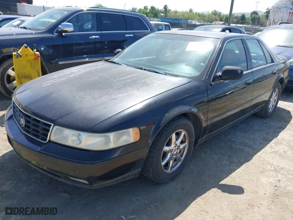 1998 Cadillac Seville Touring STS with VIN 1G6KY5499WU916185, listed as a IAAI auction lot 42035783 with 164,763 mi miles. Bid and sale history available at carsss.com. Image 2.