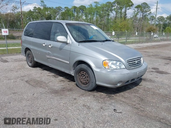 2003 Kia Sedona LX with VIN KNDUP131236417368, listed as a IAAI auction lot 41863624 with 142,896 mi miles. Bid and sale history available at carsss.com. Image 1.