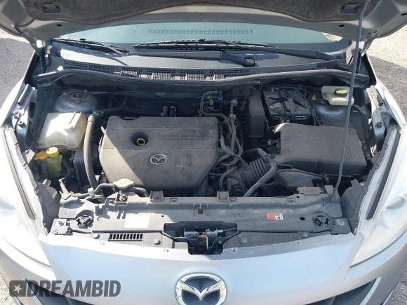 2012 Mazda 5 Sport with VIN JM1CW2BL2C0113600, listed as a IAAI auction lot 41374408 with 169,673 mi miles. Bid and sale history available at carsss.com. Image 10.