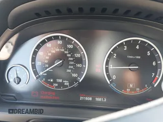 2013 BMW 5 Series 535i xDrive with VIN WBAFU7C51DDU71407, listed as a IAAI auction lot 42233098 with 211,608 mi miles and . Bid and sale history available at DreamBid. Image 7.