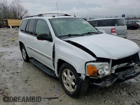 2004 GMC Envoy SLT with VIN 1GKDT13SX42404837, listed as a Copart auction lot 84515994 with 184,153 mi miles and Salvage Title. Bid and sale history available at carsss.com. Image 11.