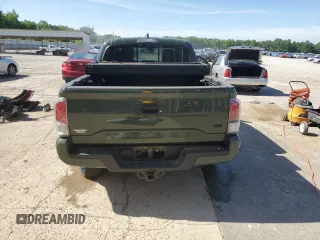 2022 Toyota Tacoma SR с VIN 3TMCZ5AN8NM519084, выставлен на аукционе Copart как лот 57512005 с пробегом 23 692 миль миль и Списание • Salvage title. История ставок и продаж доступна на DreamBid. Изображение 6.
