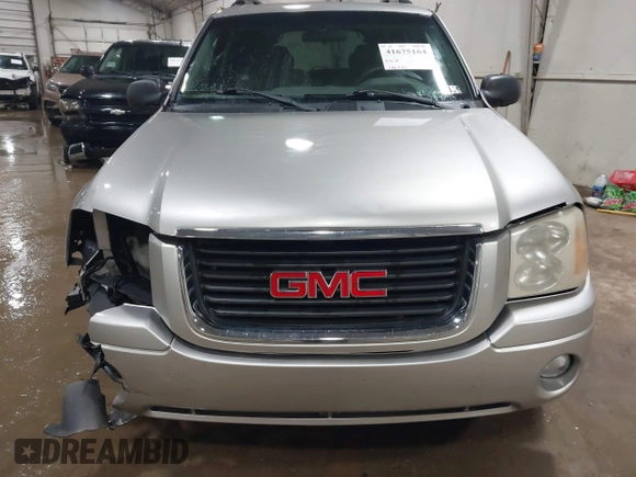 2004 GMC Envoy SLT with VIN 1GKET16S546121450, listed as a IAAI auction lot 41675164 with 196,736 mi miles and . Bid and sale history available at DreamBid. Image 12.