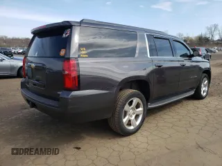 2016 Chevrolet Suburban LT with VIN 1GNSKHKC8GR107397, listed as a Copart auction lot 51874705 with 137,916 mi miles and Salvage Title. Bid and sale history available at DreamBid. Image 3.