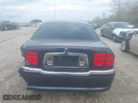 2000 Lincoln LS with VIN 1LNHM87A6YY879355, listed as a IAAI auction lot 41917760 with 70,457 mi miles. Bid and sale history available at carsss.com. Image 16.