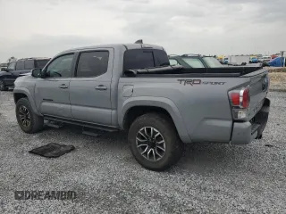 2020 Toyota Tacoma SR5 with VIN 3TMAZ5CNXLM121344, listed as a Copart auction lot 59393395 with 69,902 mi miles and Salvage title. Bid and sale history available at DreamBid. Image 2.