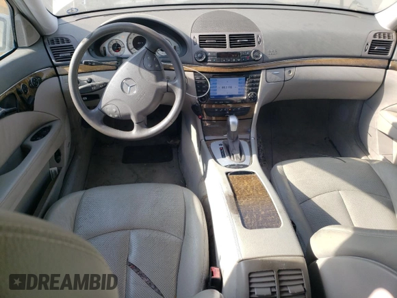 2005 Mercedes-Benz E 5.0L with VIN WDBUF70J75A693702, listed as a Copart auction lot 63497604 with 122,410 mi miles and Clean Title. Bid and sale history available at carsss.com. Image 8.