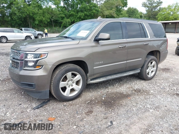 2015 Chevrolet Tahoe LT with VIN 1GNSCBKC5FR585138, listed as a IAAI auction lot 42420496 with 177,104 mi miles and . Bid and sale history available at DreamBid. Image 2.