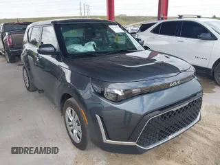 2024 Kia Soul LX with VIN KNDJ23AU1R7919964, listed as a IAAI auction lot 41795409 with 9,570 mi miles. Bid and sale history available at carsss.com. Image 1.