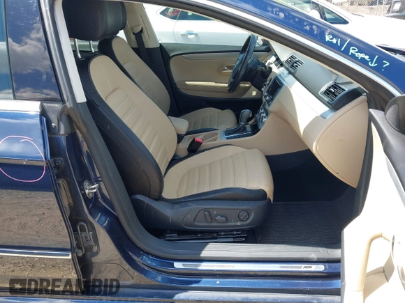 2014 Volkswagen CC R-Line with VIN WVWBP7AN7EE507463, listed as a IAAI auction lot 41984136 with 100,531 mi miles. Bid and sale history available at carsss.com. Image 5.
