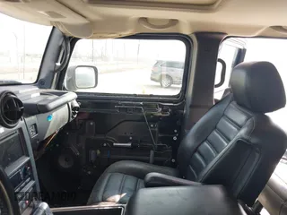 2006 Hummer H2 with VIN 5GRGN23U66H120601, listed as a IAAI auction lot 41524634 with 155,003 mi miles. Bid and sale history available at carsss.com. Image 5.
