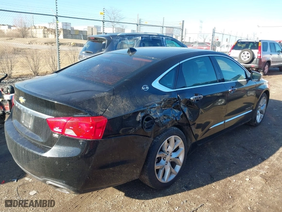 2014 Chevrolet Impala LTZ with VIN 1G1155S30EU105365, listed as a IAAI auction lot 41758977 with 135,119 mi miles. Bid and sale history available at carsss.com. Image 4.