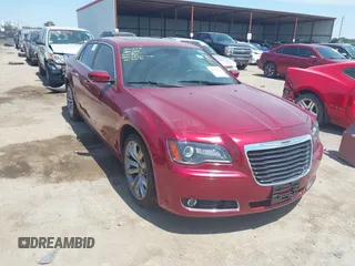 2014 Chrysler 300 with VIN 2C3CCABT2EH157487, listed as a IAAI auction lot 40127984 with 82,957 mi miles. Bid and sale history available at carsss.com. Image 1.