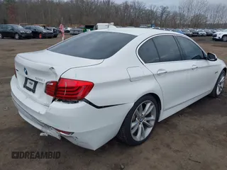 2014 BMW 5 Series 535i xDrive with VIN WBA5B3C57ED537549, listed as a IAAI auction lot 41047583 with 69,005 mi miles and . Bid and sale history available at carsss.com. Image 17.