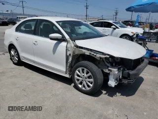 2013 Volkswagen Jetta SE with VIN 3VWDP7AJ5DM433357, listed as a Copart auction lot 61977205 with 64,384 mi miles and Salvage title. Bid and sale history available at DreamBid. Image 4.