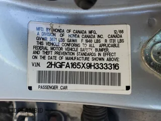 2009 Honda Civic LX z VIN 2HGFA165X9H333316, wystawiony jako Copart lot #55697715 z przebiegiem Nie podano mil oraz Szkody całkowita. Historia ofert i sprzedaży dostępna na DreamBid. Obrazek 13.