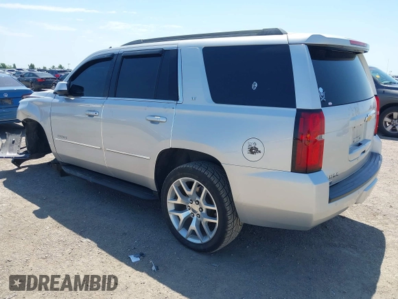 2015 Chevrolet Tahoe LT with VIN 1GNSCBKC6FR303850, listed as a IAAI auction lot 42254115 with 147,856 mi miles and . Bid and sale history available at DreamBid. Image 3.