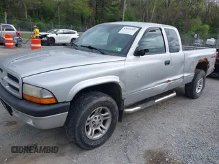 2003 Dodge Dakota Sport with VIN 1D7HG32N13S132871, listed as a IAAI auction lot 42059965 with 125,408 mi miles and . Bid and sale history available at carsss.com. Image 2.