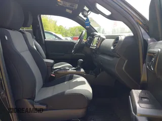 2021 Toyota Tacoma SR with VIN 3TMCZ5AN0MM417261, listed as a IAAI auction lot 42240693 with 38,625 mi miles and . Bid and sale history available at DreamBid. Image 5.
